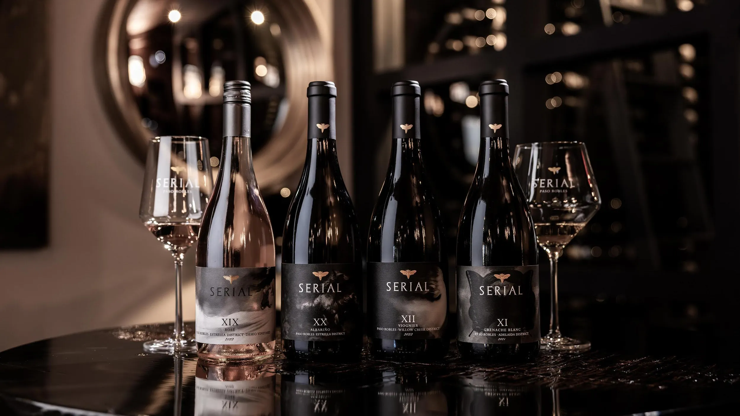 Serial Wine bottles and glass